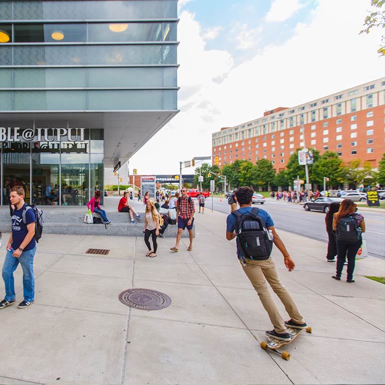 Outside of the IU Indianapolis Campus Center in busy, downtown Indianapolis.